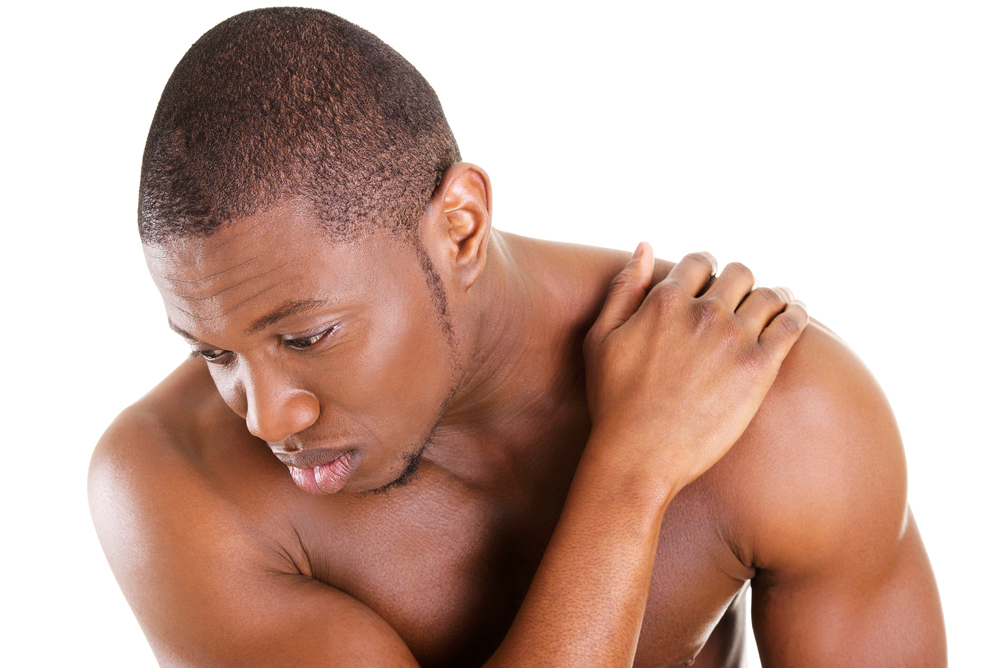 man suffering from chronic shoulder pain