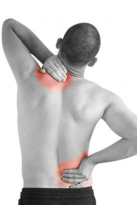man with upper back pain